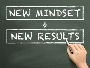 New mindset equals new results writing on a chalkboard